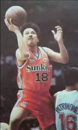 a photo of man taking a shot mid air